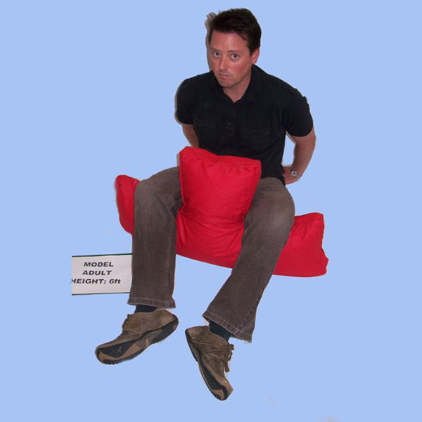 Adult using Matchett Katie T-Roll (T-Roll) support system for comfort and alignment