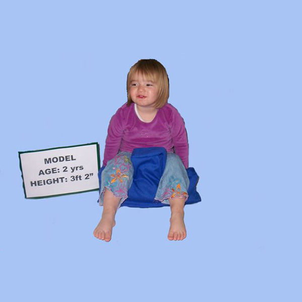 Child age 2 with Matchett support system providing sitting stability