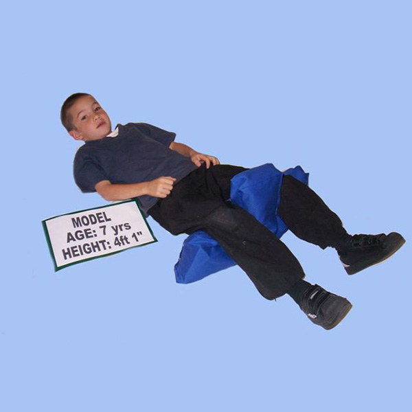 Child age 7 using Matchett support system for corrective positioning while lying